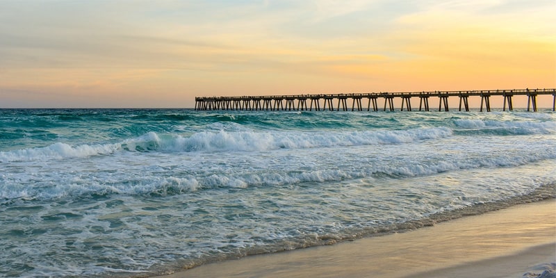 walking pier in navarre fl at sunset